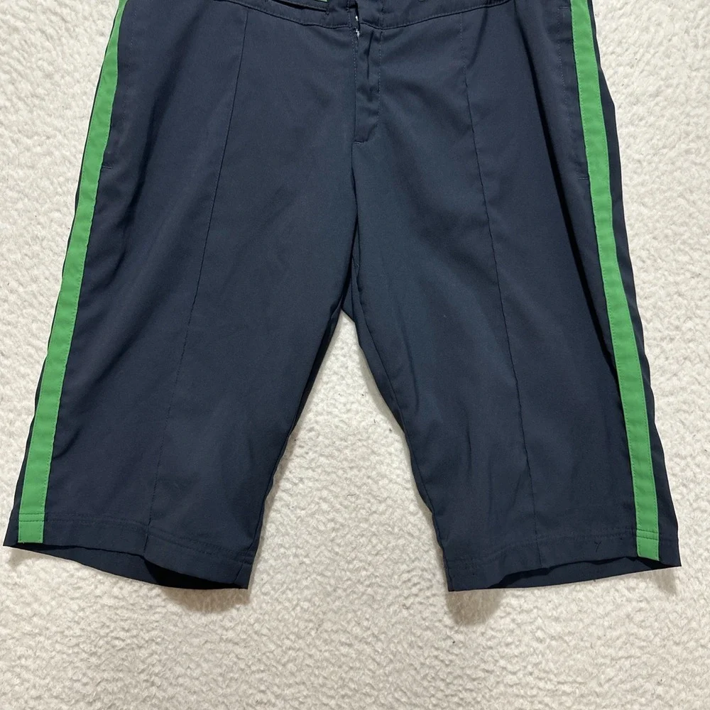 Nike Dri-Fit Sportswear‎ Shorts Size M Navy Featuring Green Stripes on the Sides